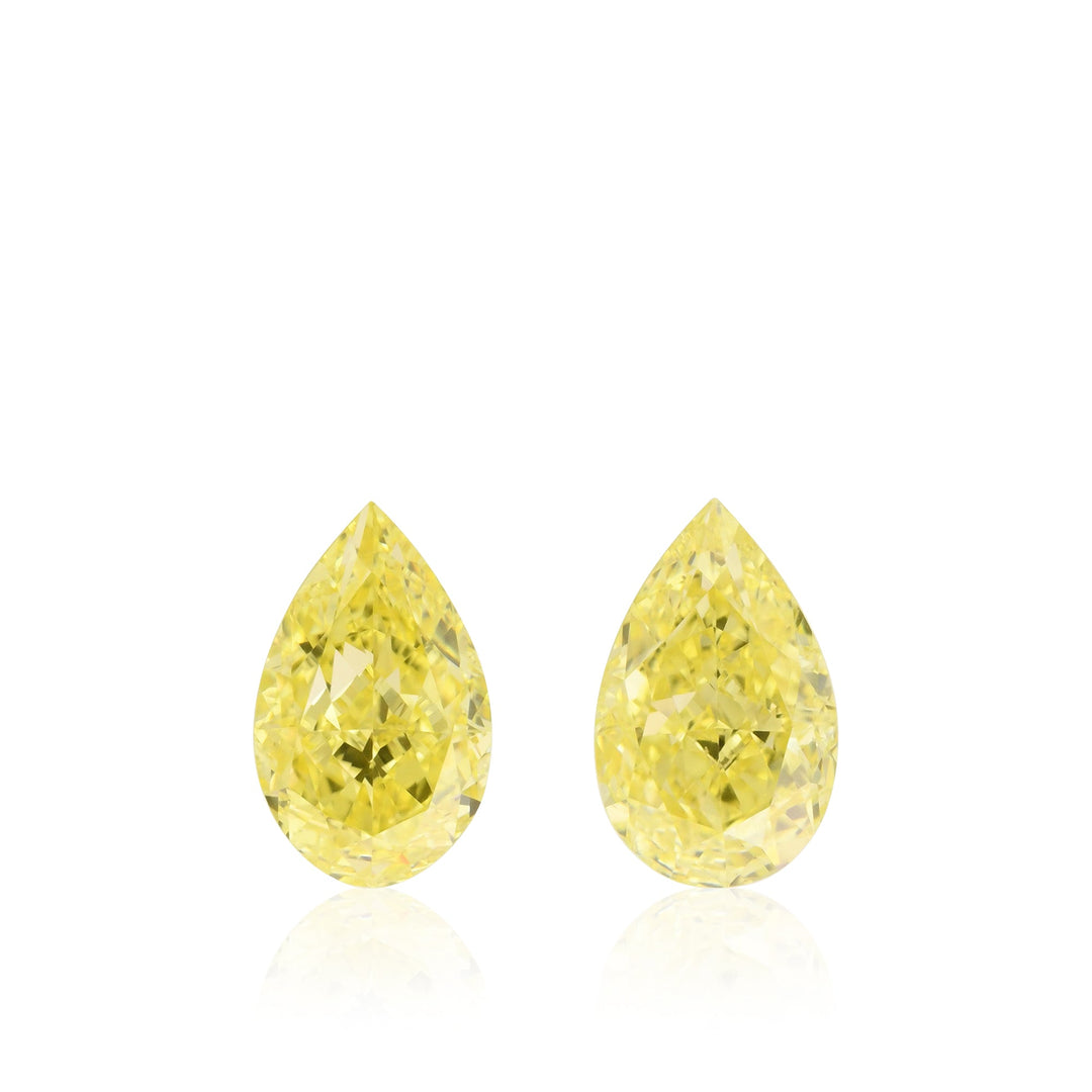 1.09 Carat Fancy Intense Yellow Pear Diamonds VS2 And VS2 GIA Pair