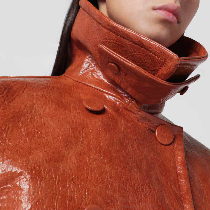 THE ANDAMANE - Tan leather-effect belted jacket